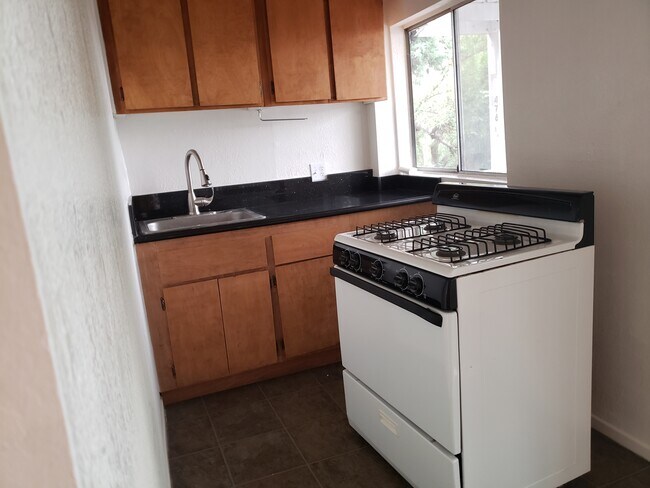 Kitchen, refrigerator not supplied - 476 1/4 Crane Blvd