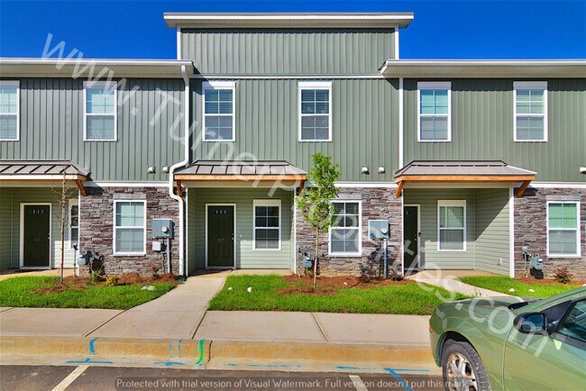 Building Photo - Awesome 2 BR Townhome w/ Granite Throughout