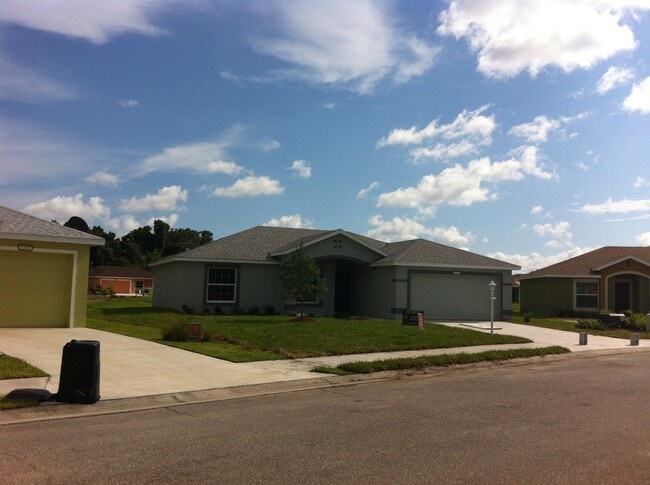Photo - Well maintained 3/2/2 with pond view and community pool House