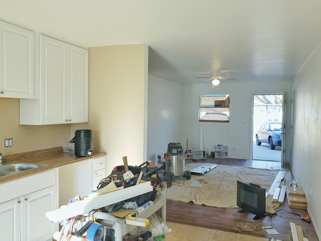 Completing flooring - 518 Parklane St