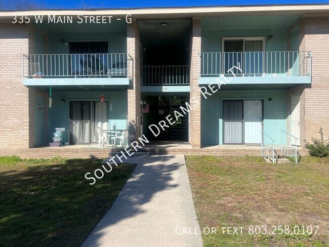Building Photo - Prime Downtown Living - 2BR, 1BA Apartment...