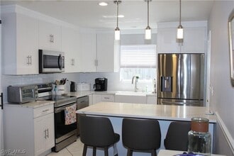 Building Photo - 858 97th Ave N