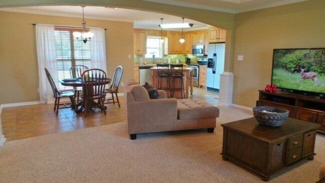 Building Photo - Modern Elegance Meets Spacious Comfort: 4B...