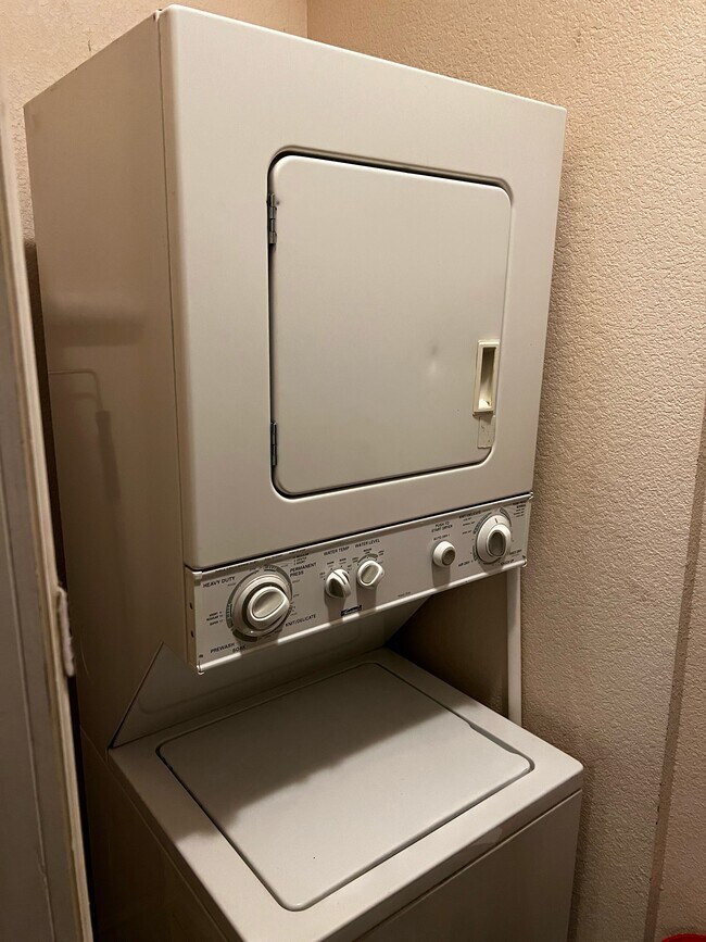 Washer/dryer in common area. - 1456 Pennsylvania St