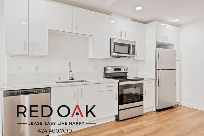 Foto del edificio - Modern One Bedroom with Stainless Steel Ap...