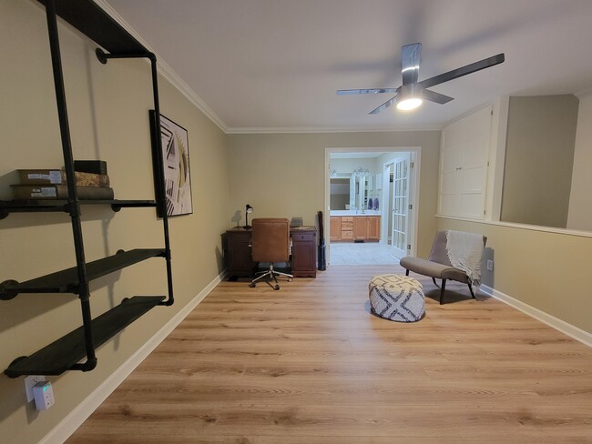 The bedroom view towards the bathroom. Dedicated workspace to the left. - 1201 Louisiana St