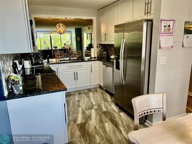 Building Photo - 9787 N Belfort Cir