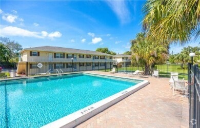 Building Photo - Poinciana Apartments