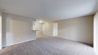 Located at 10925 Beamer Rd in Houston, TX, this single-story, 2-bedroom, 2-bathroom home offers a practical and comfortable layout. The open-concept living and dining area is generously sized, featuring neutral-toned carpet and a smooth ceiling that creates a bright, airy feel. A half-wall breakfast bar connects the living space to the galley-style kitchen, which is well-equipped with white cabinetry, laminate countertops, a coil-top electric range, refrigerator, dishwasher, and a stainless steel sink — all finished with durable tile flooring. Both bedrooms are carpeted and bathed in natural light through blinded windows, each fitted with a ceiling fan for year-round comfort. The primary bedroom includes a spacious walk-in closet with built-in shelving and hanging rods, offering ample storage. The bathrooms feature tile flooring and tub-shower combinations with white tile surrounds. Throughout the home, warm beige tones and clean finishes create a consistent, understated aesthetic. Two closets provide additional storage solutions across the floor plan, rounding out this functional and well-organized residence.