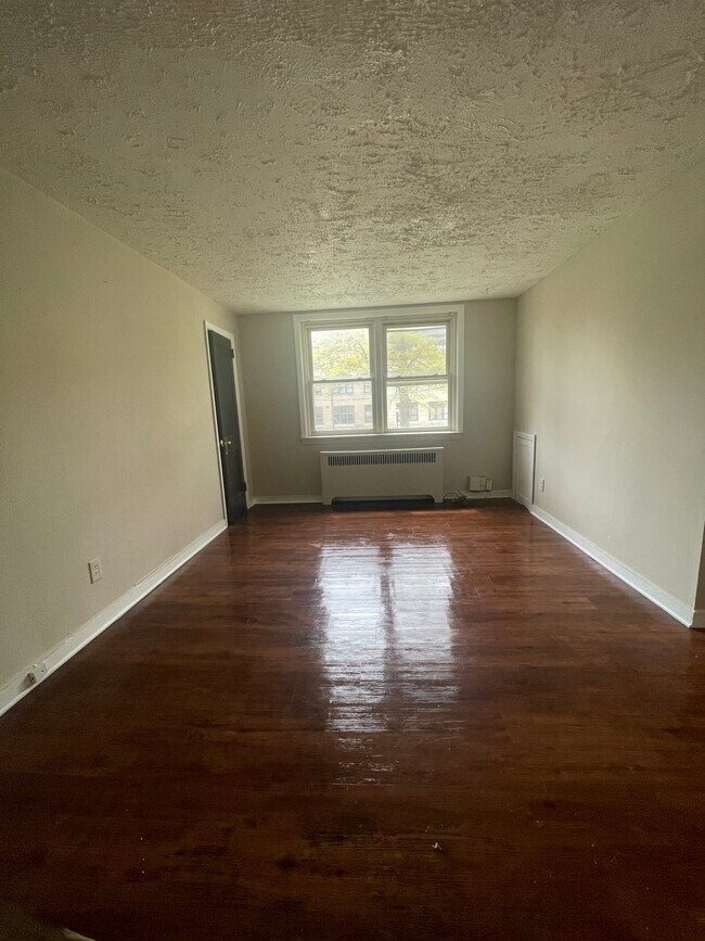 Living room, this door is access to the closet - 1868 Park Blvd