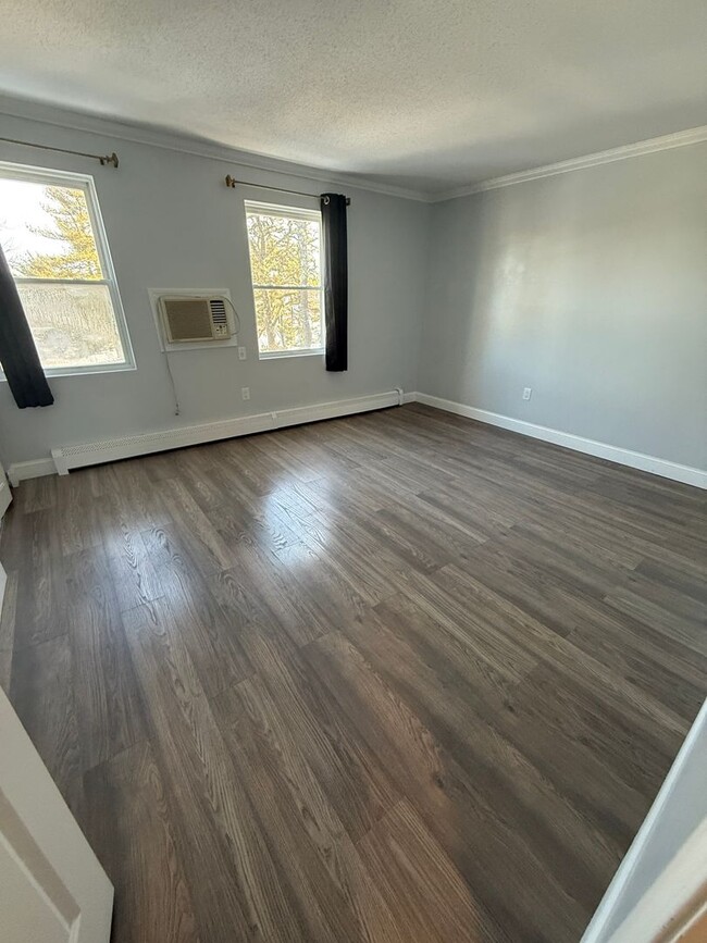 Building Photo - A two bedroom, 1 and a half bath unit in Townhouse. Unit 11-$2,800 per month plus utilities