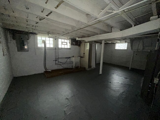Building Photo - "Charming 4-Bedroom Oasis: Your Perfect Bl...