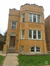 Building Photo - 5057 W Newport Ave