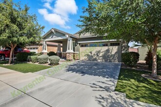 Building Photo - 7050 E Onza Ave