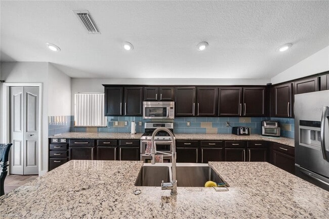 Building Photo - 4 br, 3 bath House - 5608 Hawkgrove Place