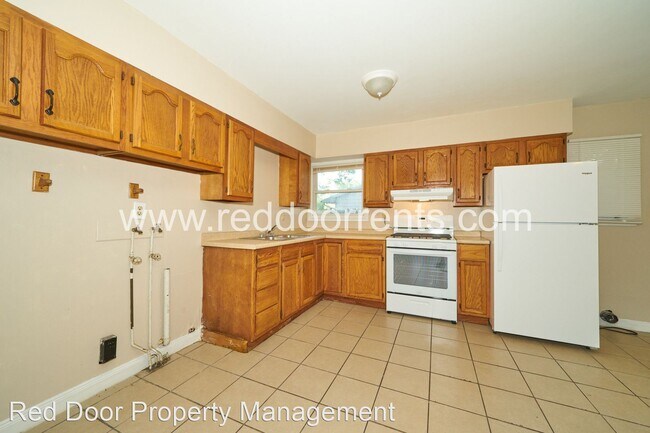 Building Photo - 4 br, 1 bath House - 5201 Thrush Drive