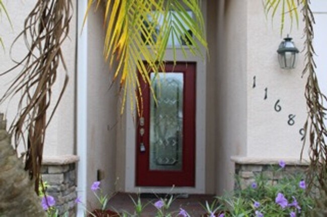 Building Photo - Spacious 4-Bedroom Home in Lehigh Acres' S...