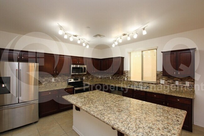 Building Photo - 9218 W Meadow Dr