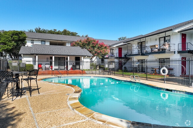 Resort-style pool with lounge seating and sun deck to relax daily - Renaissance Gardens Apartments