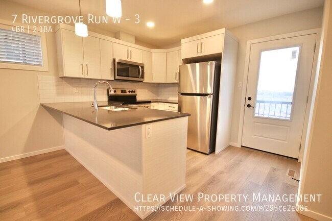 Photo du bâtiment - Four-bedroom, 2.5-bathroom, pet friendly townhouse in Riverstone! ??PROMO: 1ST HALF MONTH FREE??