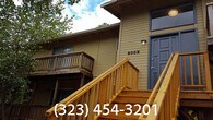 Balconies off two largest bedrooms - 2002 Floral Hill Dr