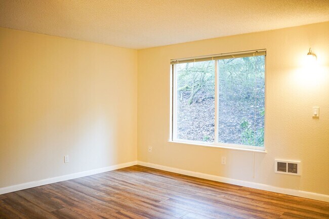 Building Photo - Spacious 1-Bed Surrounded by Tall Trees & Just Blocks from Popular Multnomah Village!