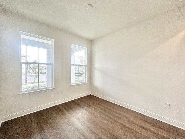 Building Photo - Gorgeous 4/3 Residence with a Private Back Lanai and a 3 Car Garage in the Delightful Laureate Pa...