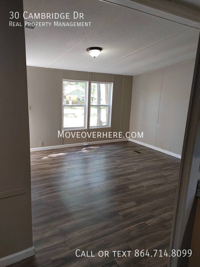 Building Photo - This is a 3-bedroom, 2-bathroom manufactur...