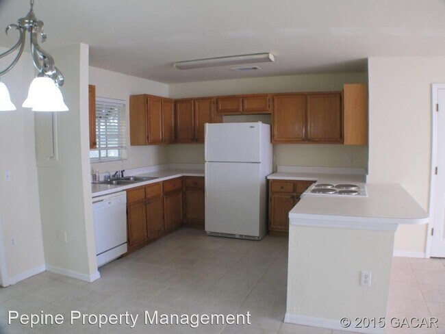 Building Photo - 2 br, 2.5 bath House - 5205 SW 97th Drive