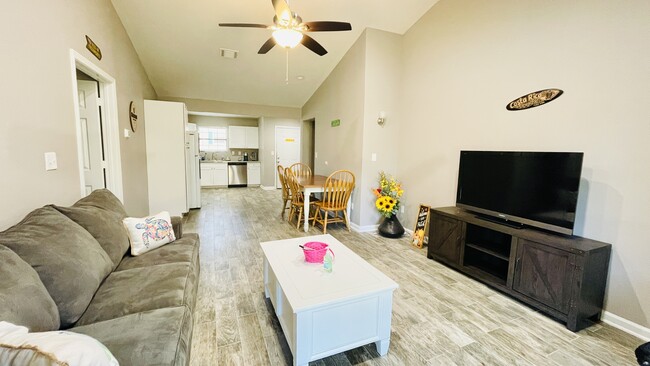 Open concept living and dining space. - 3487 Balboa Cir