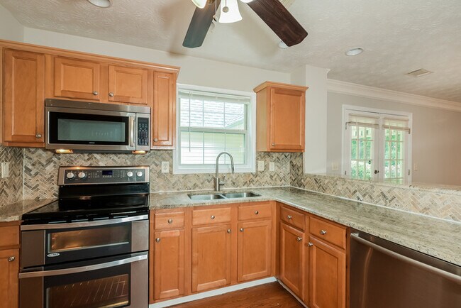 Building Photo - Charming Home on Spacious Tree-Lined Lot