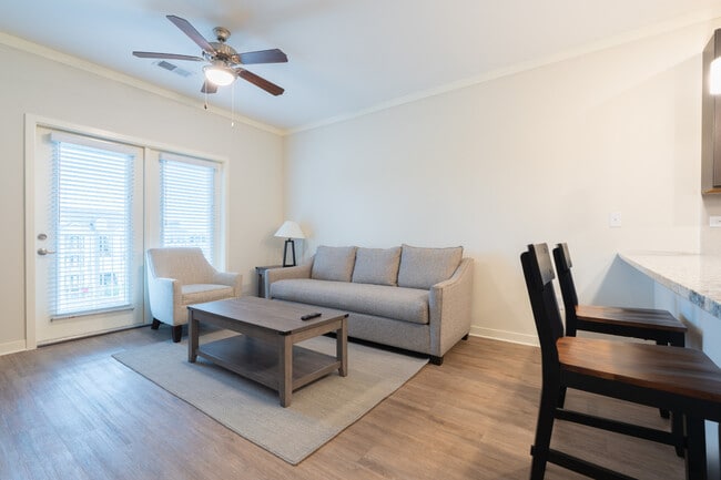MODERA 1 BR | 1 BA Living Room - The Reserve at Cool Springs