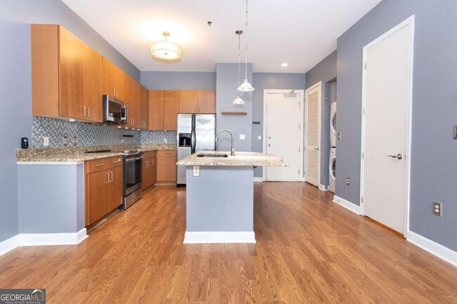Building Photo - 711 Cosmopolitan Dr NE