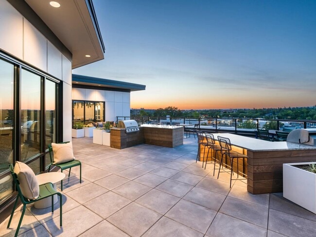 Take in the outdoors while you dine al fresco or simply socialize on our rooftop terrace. - Modera Beaverton