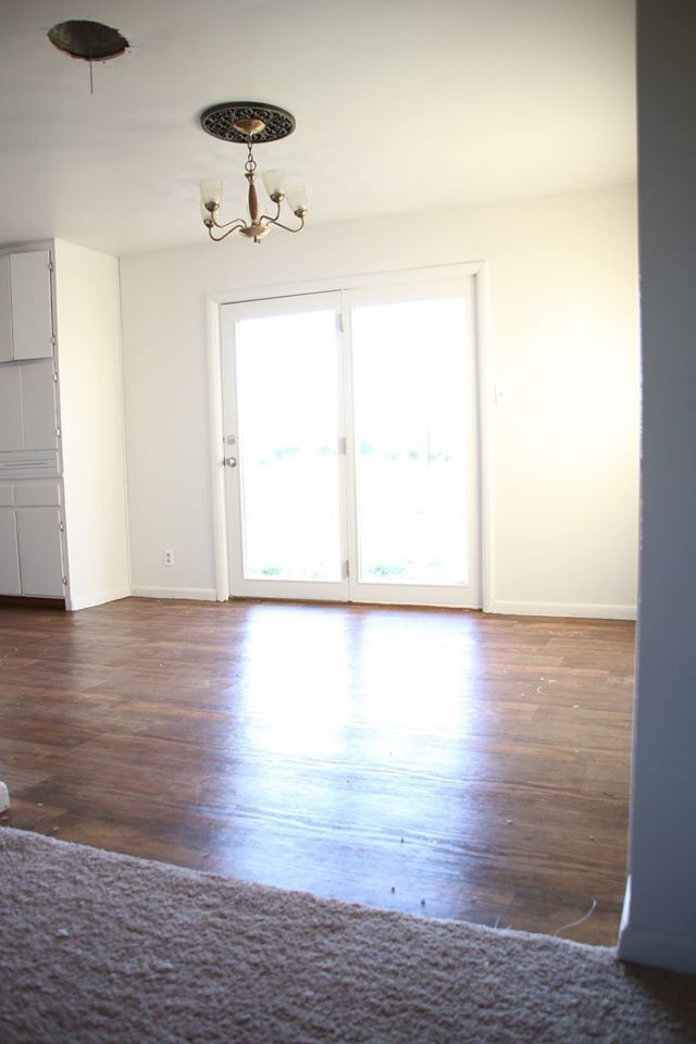 Second view of dining room with view of french door to backyard. - 1605 Wilson St