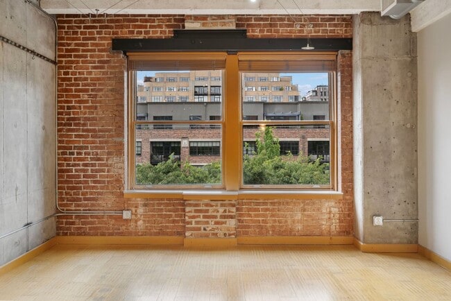 Building Photo - Historic Chown Pella Lofts - east facing studio w/parking/most utilities/rooftop deck