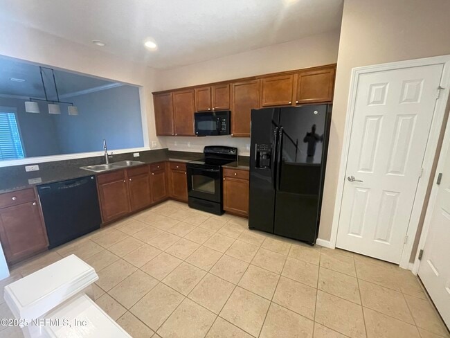 Foto del edificio - 6937 Woody Vine Dr