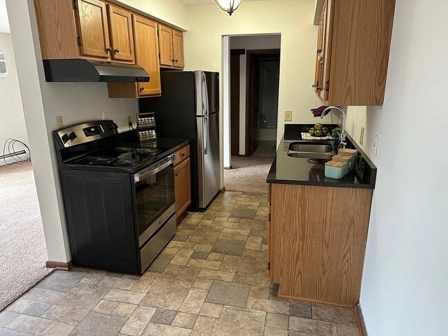Black Granite Counters with Tile Floors - Northumberland Apartments