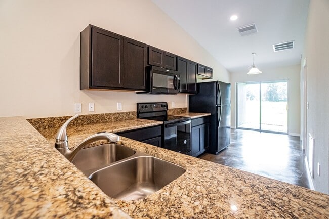 Building Photo - Brand New Beautiful 3/2 Energy Efficient 1...