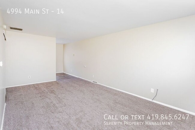 Building Photo - Fall In Love With This Two bedroom Townhom...