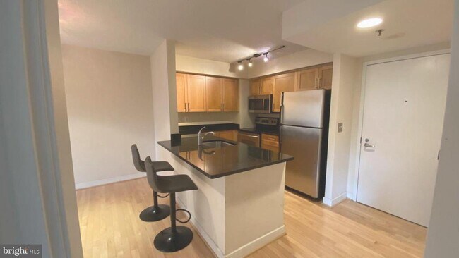 Building Photo - 7500 Woodmont Ave