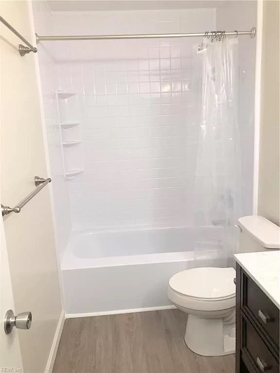 Full bath upstairs. This is *not* an actual picture of the property. This is a picture of an identical unit in the same complex with similar finishes. Actual photos will be uploaded after 4/1/21 when the new carpet is installed. - 1005 Willow Green Dr