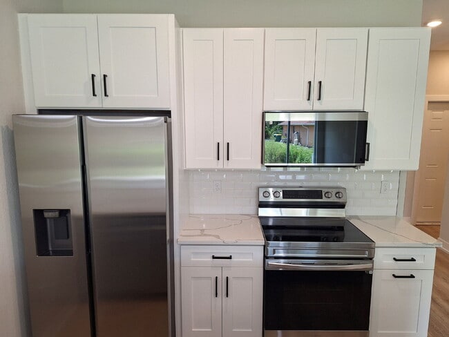 Building Photo - Available with ZERO DEPOSIT MOVE-IN!