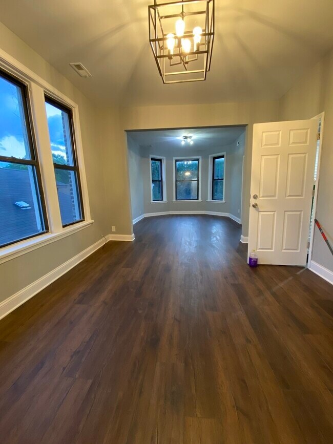 Building Photo - 7417 S Langley Ave