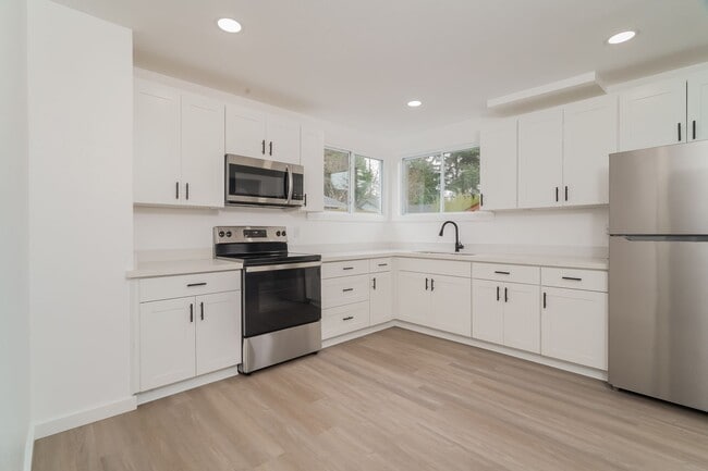 Building Photo - Modern Comfort Meets Burien Charm – Remode...
