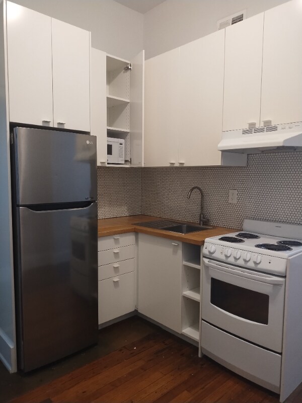 Foto del edificio - 309 E 13th St