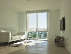 Building Photo - 8888 Collins Ave