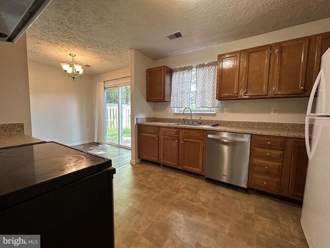 Building Photo - 8625 Cartwright Ct