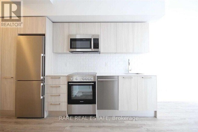 Building Photo - 28 Wellesley St E