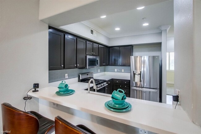 Building Photo - 3 br, 3 bath Townhome - 1338 Caminito Fabr...